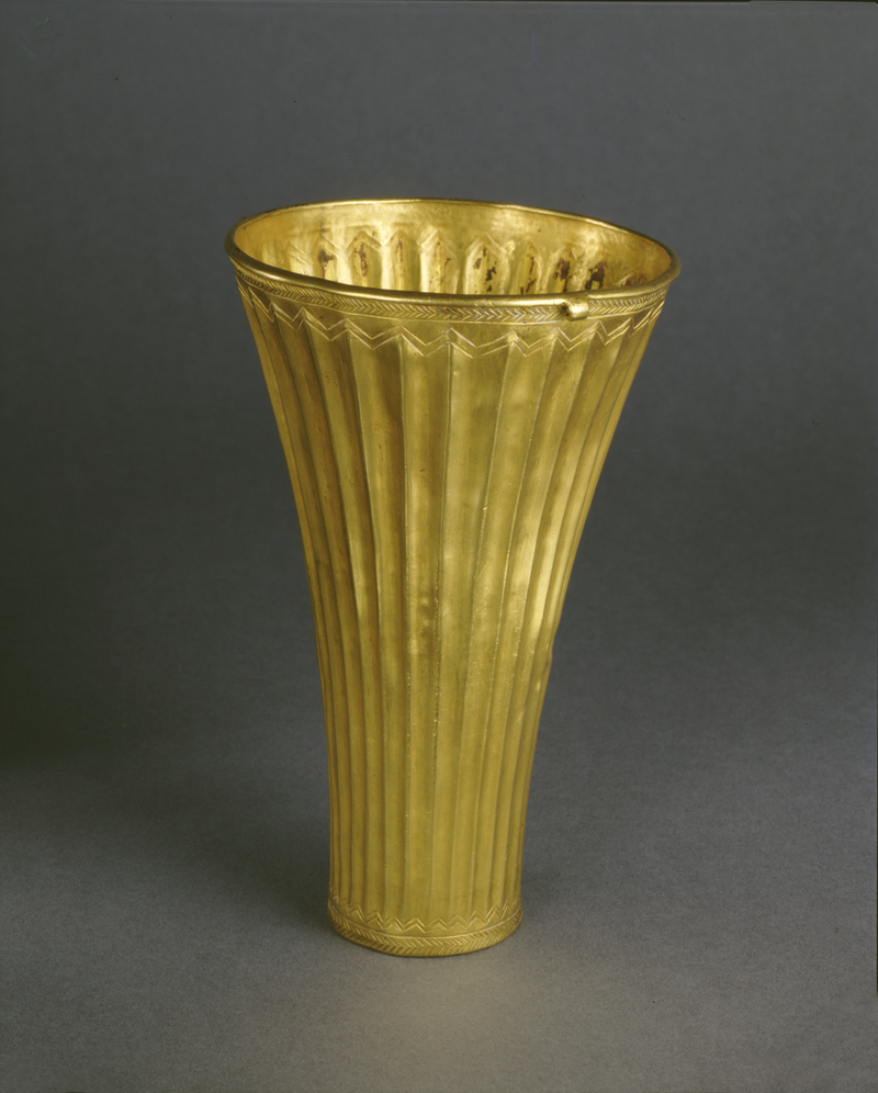 Gold, fluted tumbler.