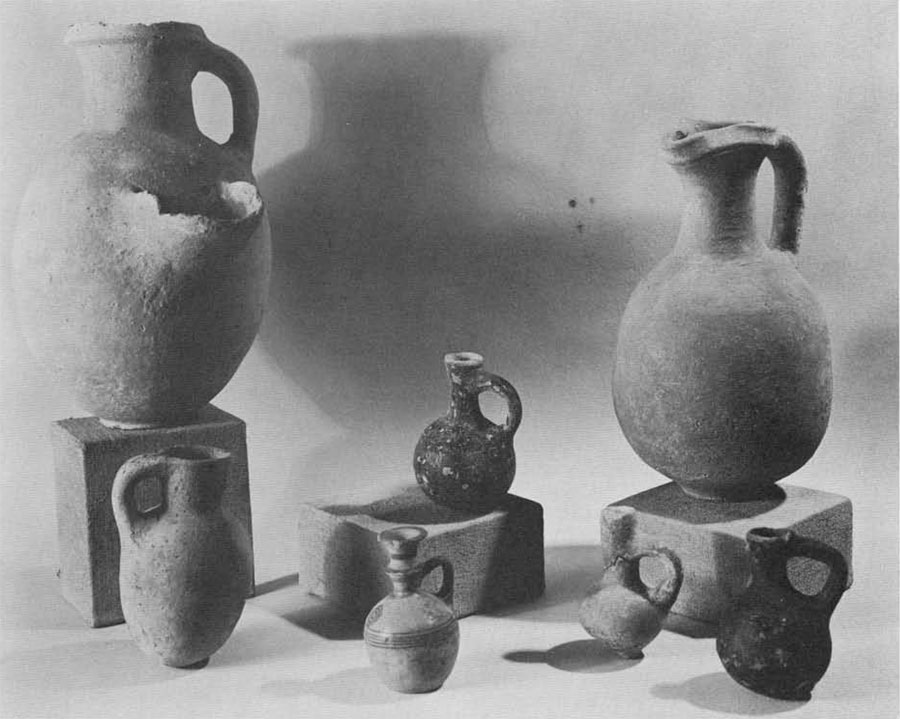 Two large jugs and five juglets.
