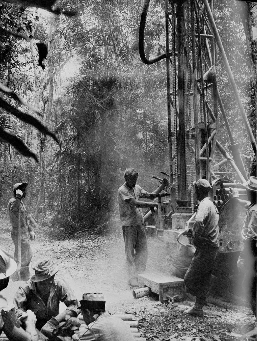 Photo of men drilling