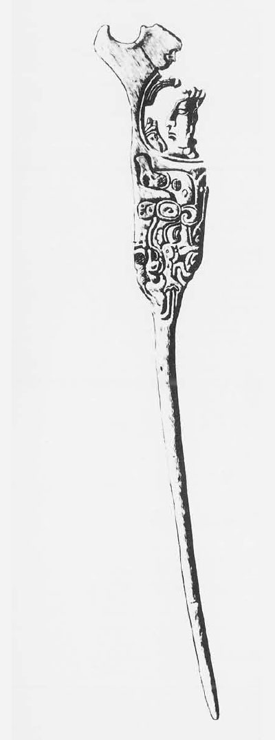 Drawing of a bone awl, a depiction a priest on the handle.