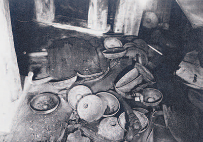 Collapsed tables in the King's Tomb, and bronze bowl. 