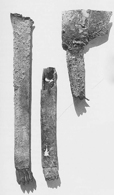 Fragmented bronze tripod of Greek type from Tumulus E; 6th century B.C. Gordion inventory B 428. Longest piece 58 cm. 