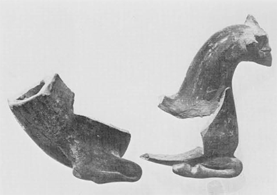 Phrygian black polished horse rhyton in imitation of an Achaemenid type; the series begins in Persian times and apparently continues well into the Hellenistic period. Gordion inventory P 2583 and P 666. Height of fore section, 12.2 cm. 