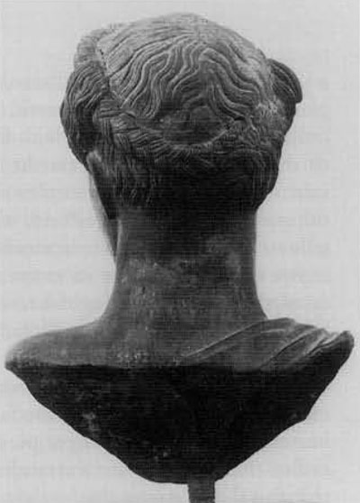 Fig. 11. The Herculanean head, rear view. Note the single braid originating to the right of the central axis, with no corresponding arrangement to the left. The ancient break and the modern repair clearly do not affect the course of the plait.National Museum, Naples, no. 5592