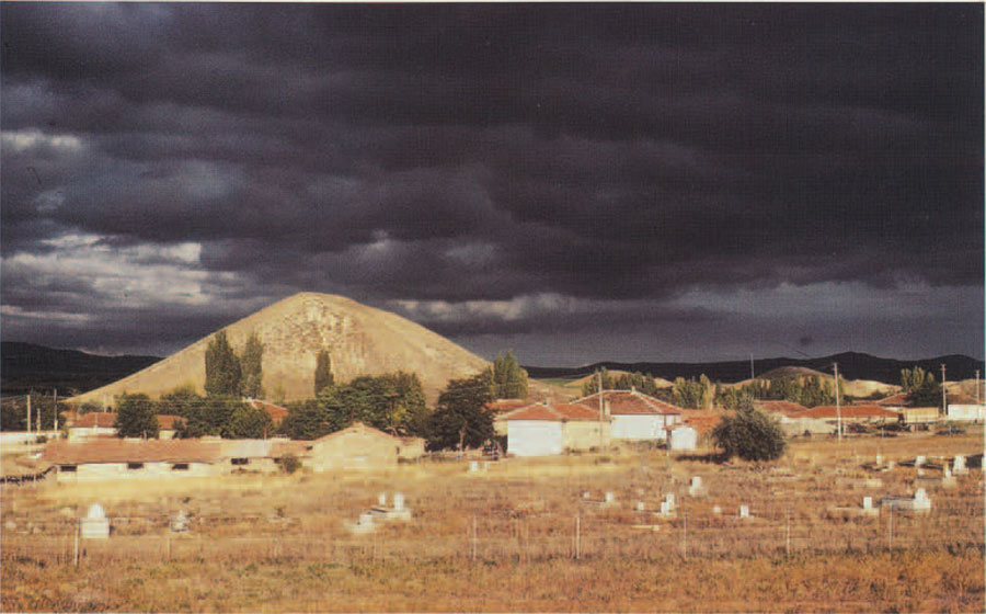Fig. 3. The Midas Mound looms over the modern village of Yassihoyuk and the village cemetery in the foreground. Photo by Naomi F. Miller