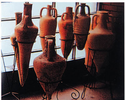 A display of carrot-shaped amphorae.