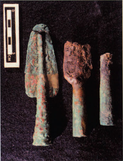 Three bronze spearheads or spearhead sockets. The socket at the top is from Ban Tong; the other two are from Ban Chiang. The middle spearhead has a bronze socket and an iron head.