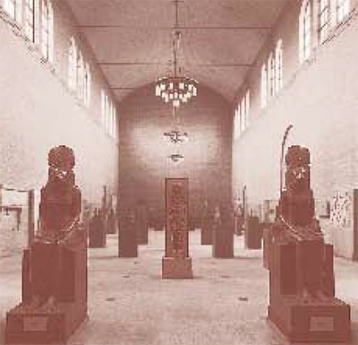 View of the Upper Egyptian Gallery, looking west, with original chandeliers, 1926