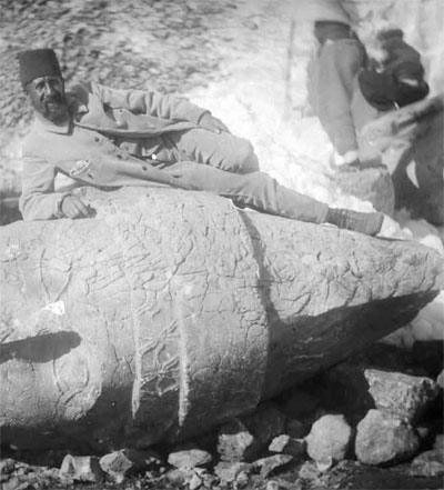 Osman Hamdi Bey organized his first archaeological mission in 1883 to beat the Germans to the Commagene Tumulus at Nemrut Dag ̆ ı in southern Turkey. He poses on a giant stone head. From Osman Hamdi Bey and Osgan Effendi, Le Tumulus de Nemroud-Dagh.