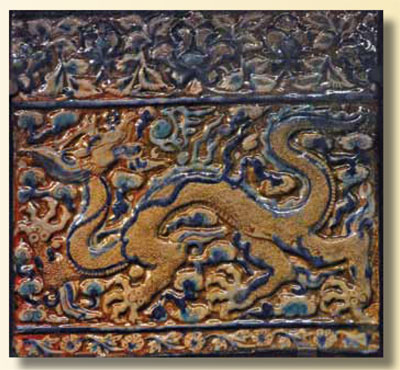 A tile depicting a dragon amongst the clouds.