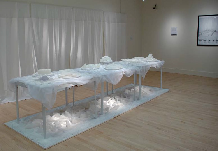 Last Supper (2011). 10' x 20' x 20', wax, glass, salt, table, curtain, sound, and small and large digital prints.  Mixed media installation for Vision Project Solo Exhibition, Museum of Contemporary Native Arts, Santa Fe, New Mexico. Photos by Dianne Stromberg, courtesy of the Museum of Contemporary Native Arts.