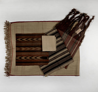 Examples of plain weave, warp-striped, and ikat cloth made by Malagasy people from Madagascar were exhibited at the Paris Exposition. UPM object #2003-65-111, 2003-65-140, 2003-65-131, 2003-65-124, 2003-65-87.