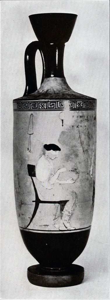 A tall lekythos with a depiction of a mistress and her maid, the mistress is seated