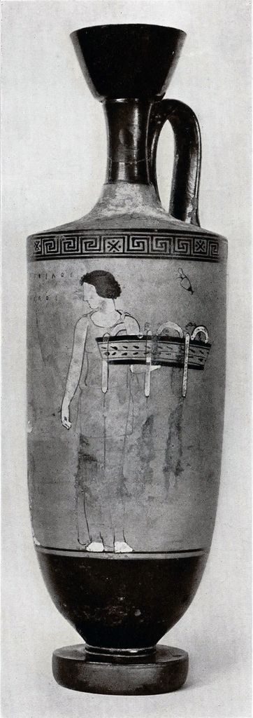 A tall lekythos with a depiction of a mistress and her maid, the maid standing and carrying a tray of goods 