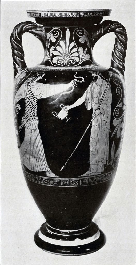 A tall red figure amphora with with two twisted handles showing Dionysus and a Maenad
