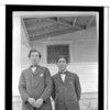 An-g and Gerdon. Two men in modern suits in front of modern house. 1918. Haines, Alaska.