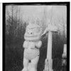 Shotridge field negative #3. Alaska. Marble tomb stones, representations of family crests instead of wood carvings in fronts of grave houses. are now seen on the modern graves of the Tlingit people. Florence Shotridgeâ€™s grave.