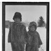 Gutc - uxu. Wolf's tooth, T w-tu, Within Sand. Two children in winter dress. Kluckwan. Winter 1917.