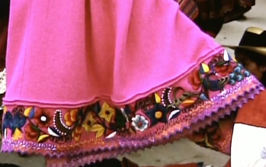 Pink skirt with embroidery work on the edge.