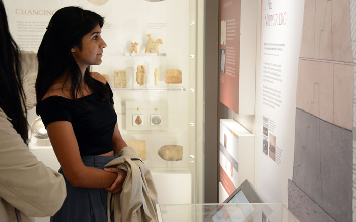 Woman looking at exhibit.