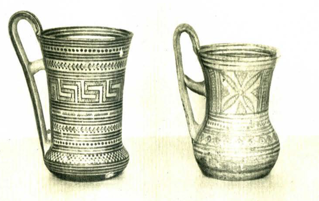 Two geometric cups or tankards with single handles