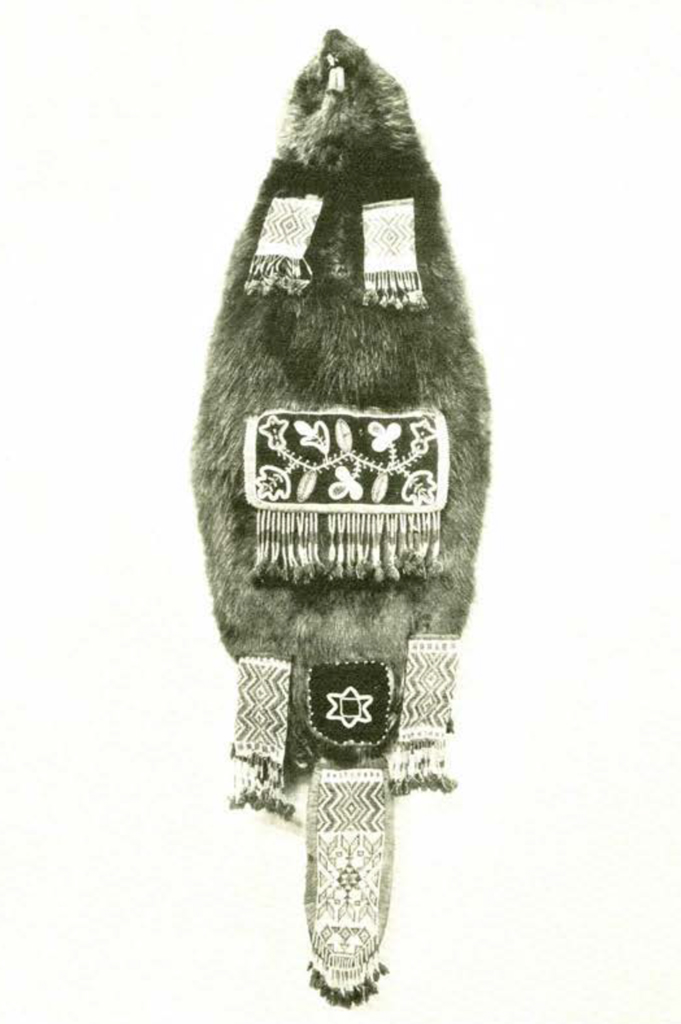 A bag made of a beaver decorated with beads
