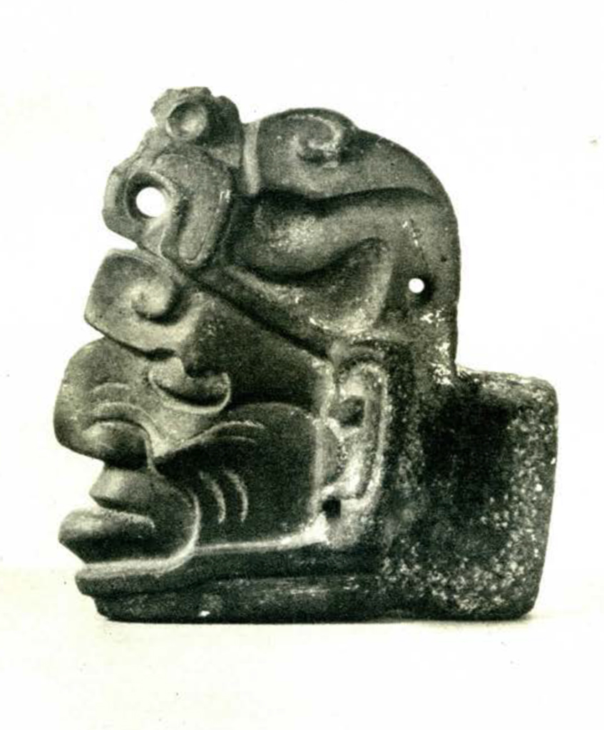 A jadeite head of a god