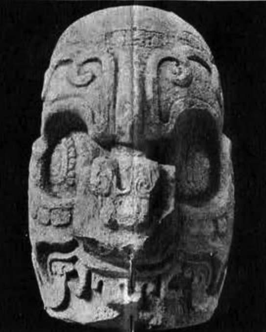Leg of an altar depicting a decorative carved face