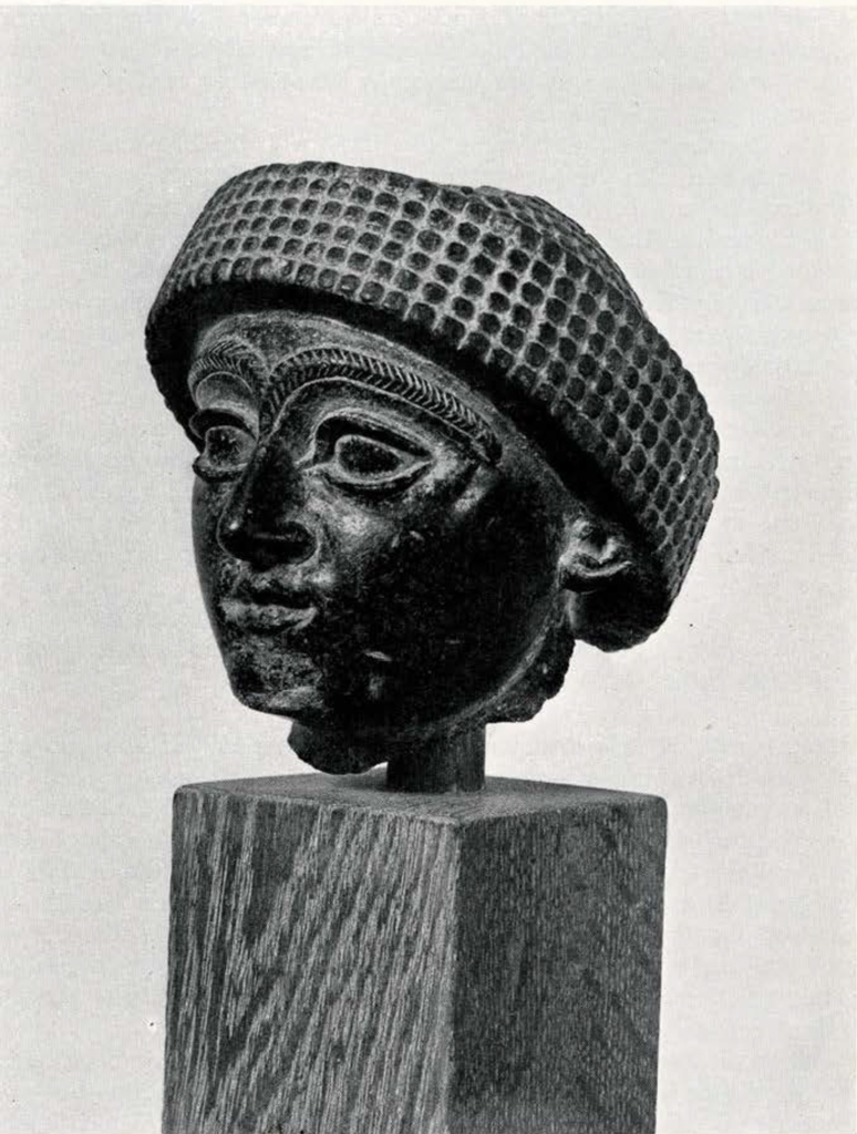 Diorite head of Gudea wearing a turban, chin is chipped