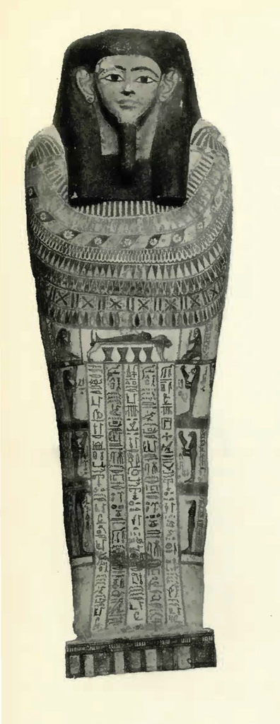 Coffin lid depicting a realistic head and face, the body covered in designs and columns of hieroglyphs