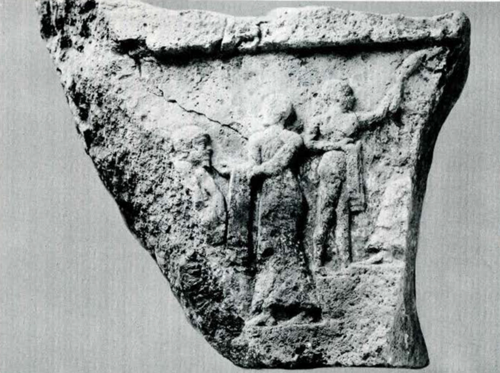 Fragment of a stela showing wrestlers