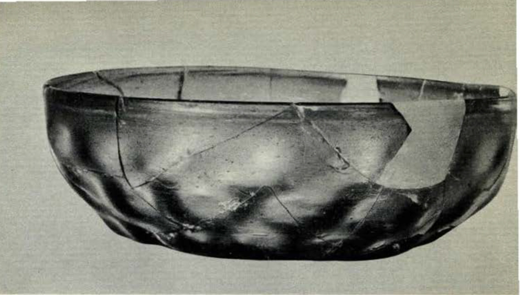 A shallow glass bowl with dimpling