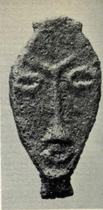 Small bronze plaque of a long, narrow face