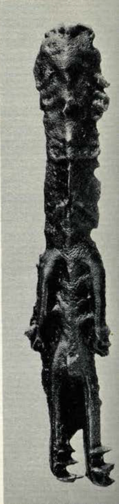 Small bronze animal figure, long and narrow