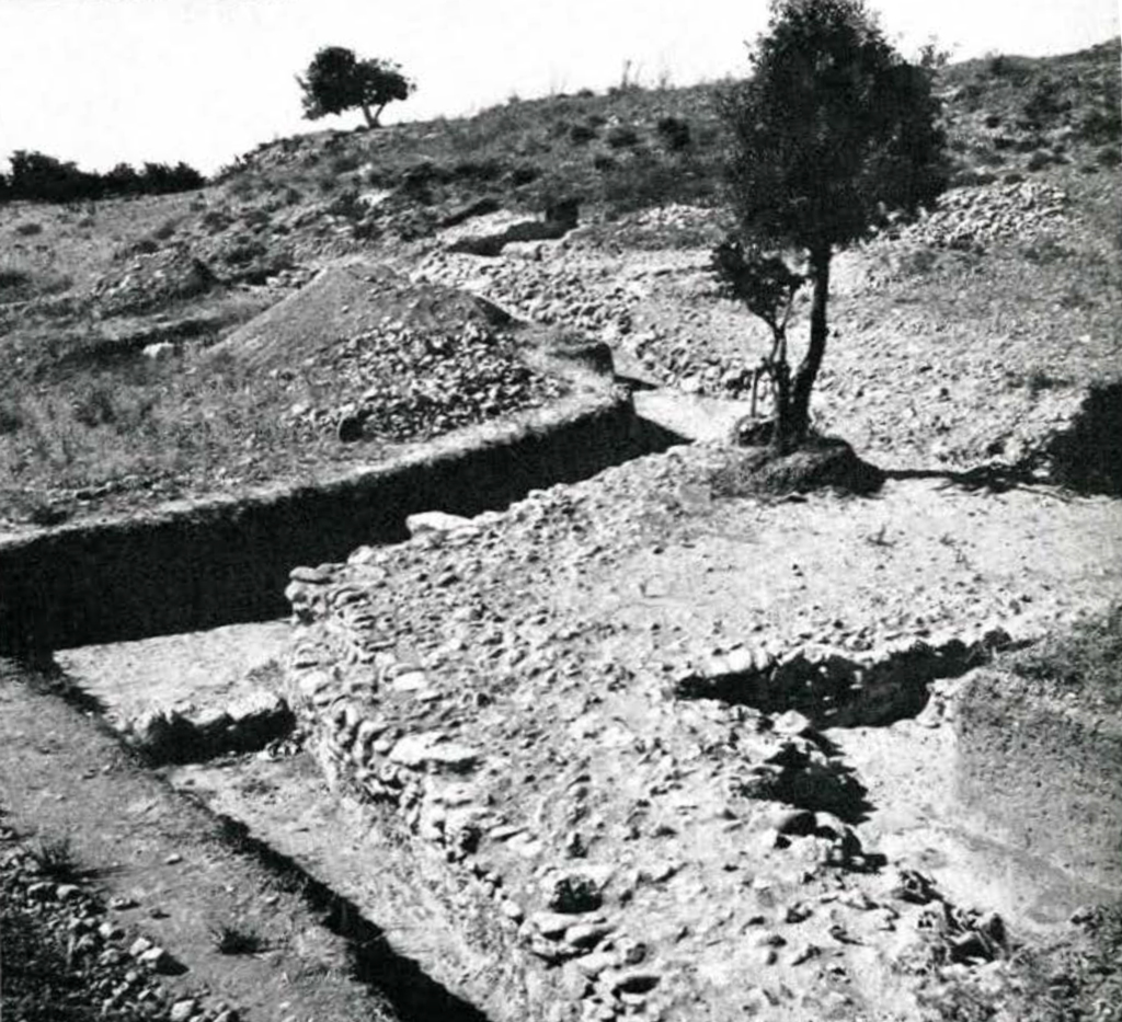 Excavated path and wall