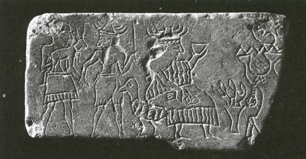 Part of a plaque showing a goddess seated on a goose, two worshippers with her, one of them holding a horned animal