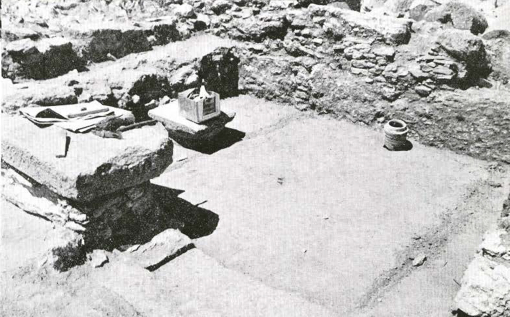 Excavated floor of a room with foundations cleared