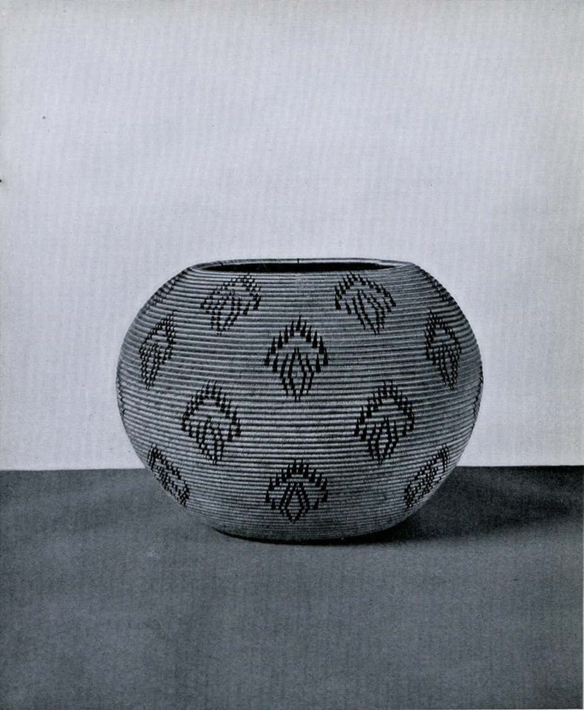A spherical woven basket with a repeated pattern