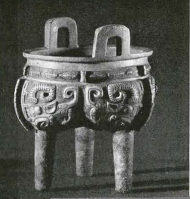 Tripod vessel with two handles