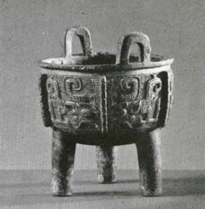 Tripod vessel with two handles