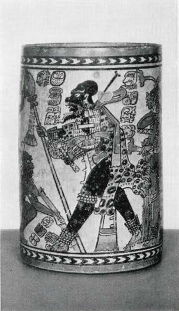 Painted polychrome Chama vase showing a figure wearing a leopard skin and a variety of glyphs