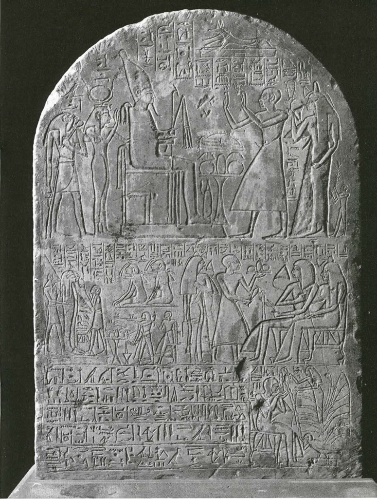 Funerary stelae with three registers depicting the deceased receiving gifts and going through preservation and funerary rites and rituals, along with columns and rows of hieroglyphic inscriptions