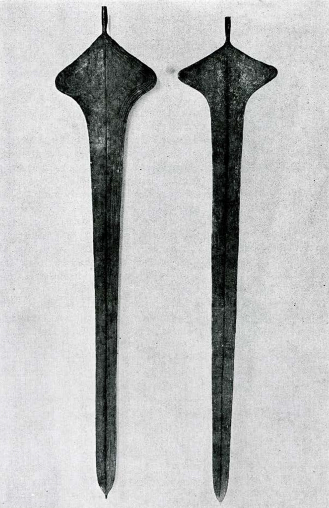 Two cross shaped spears or spearheads