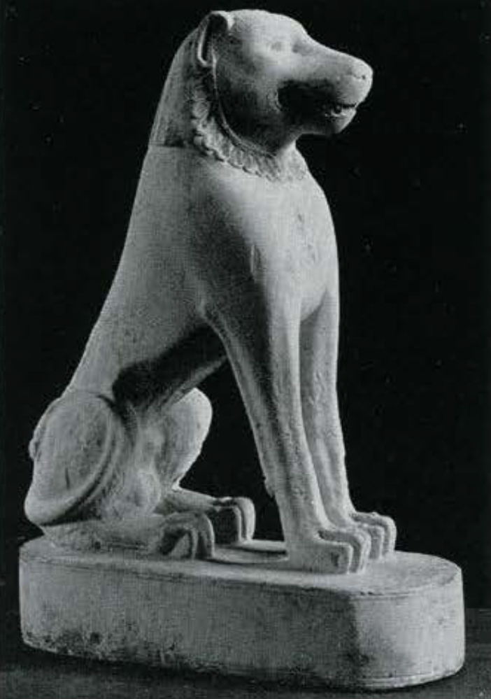 A statue of a stylized seated lion.