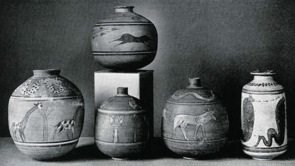 Five painted vases depicting animals.