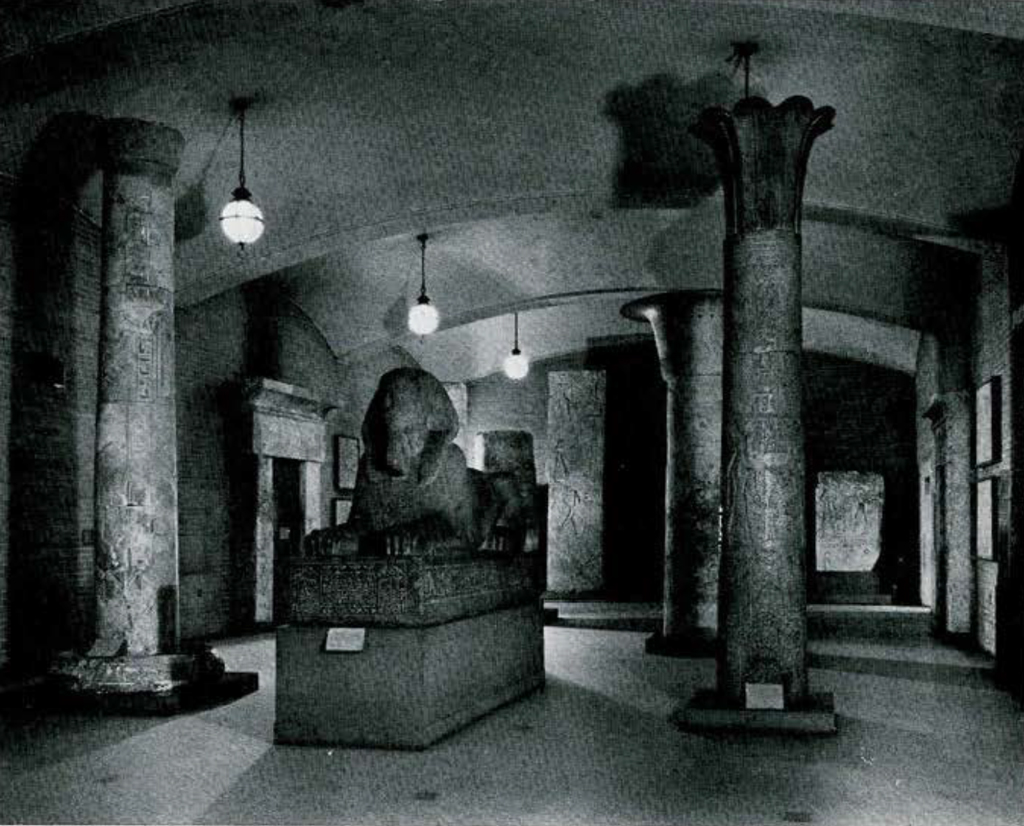 View of the Lower Egyptian hall showing the sphinx and two massive columns.