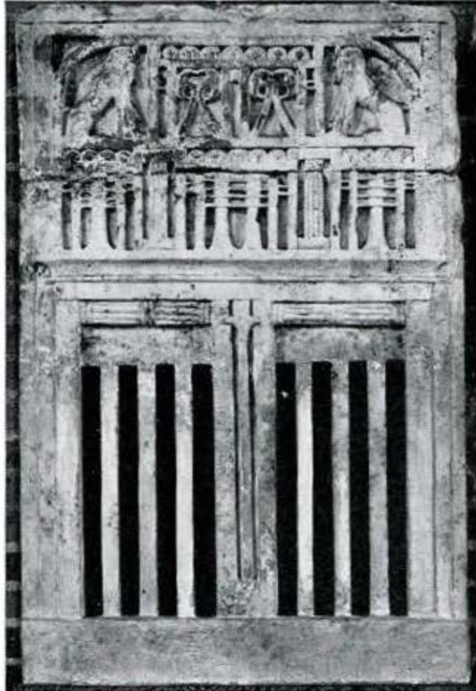 Window from the palace of Merenptah, upper part of the window is decorated with Sphinxes, a row of falcon heads, djed pillars and a rolled up reed mat, lower part of the window has 8 slits to let in light.