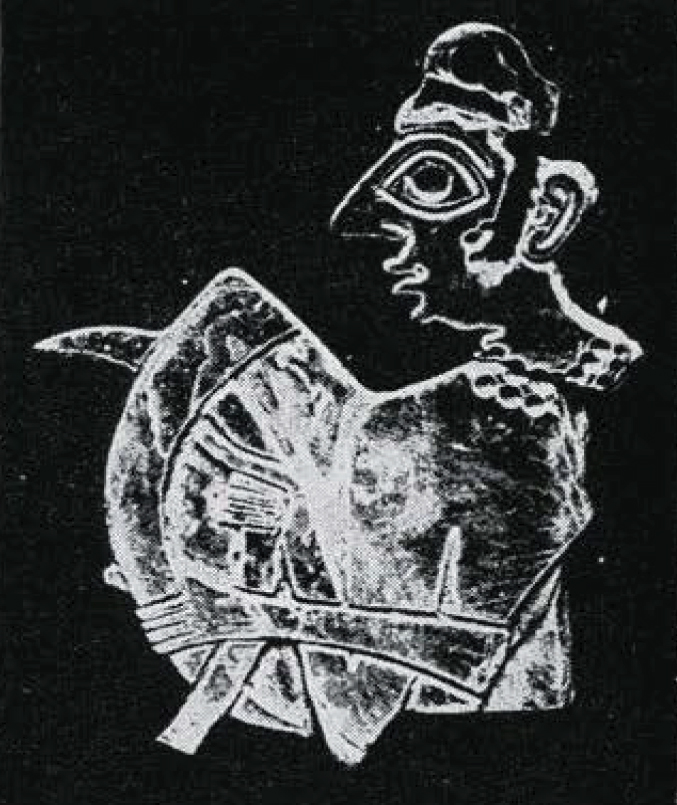 An impresssion of a dipiction of a dancer holding a clapper.