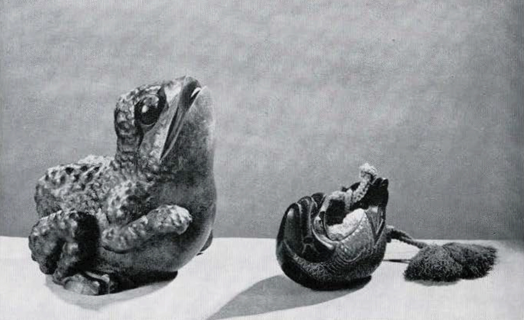 A frog shaped drum and a fish shaped drum.