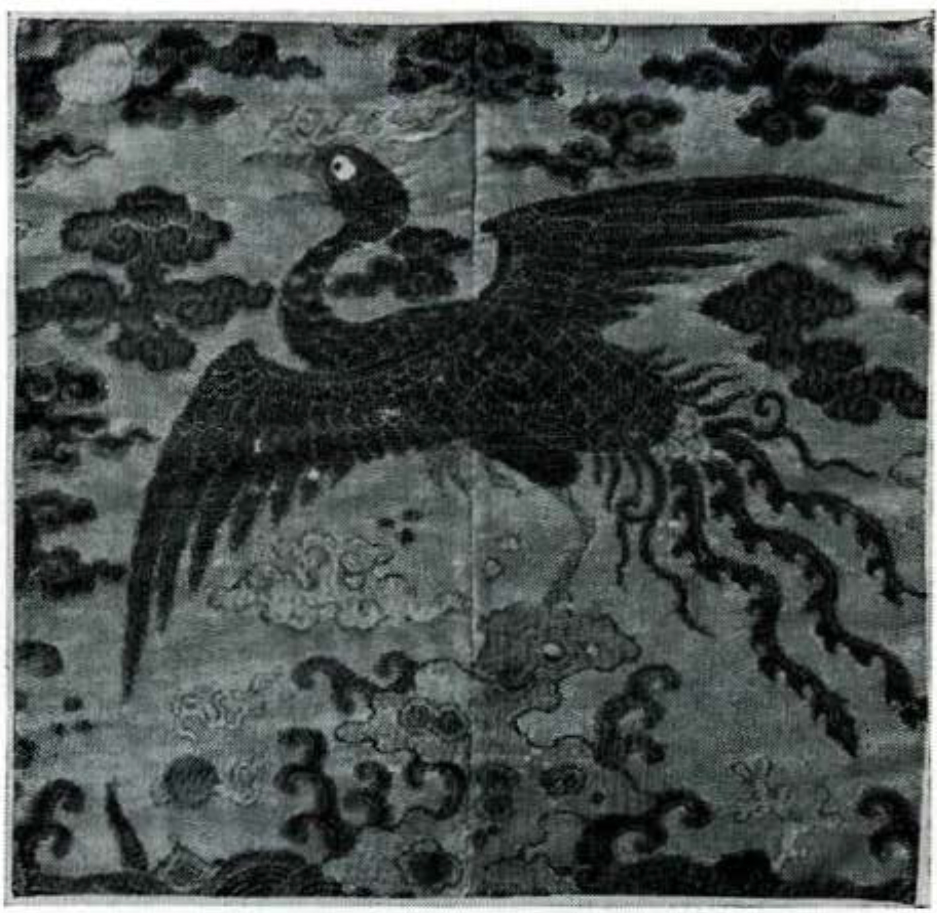 Civil official's rank badge, 5th rank, at the center a silver pheasant(which is woven here in brown)stands with wings spread, he is perched on one foot on a rock amidst waves.